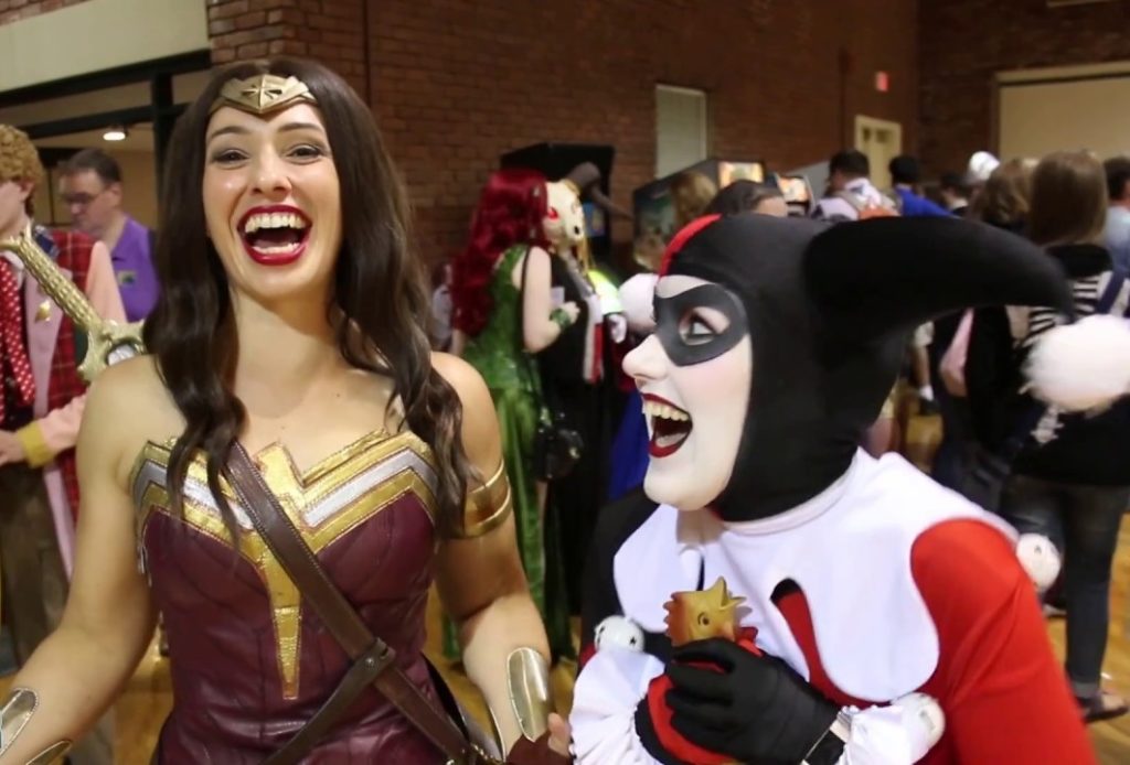 Cosplayers laughing.
